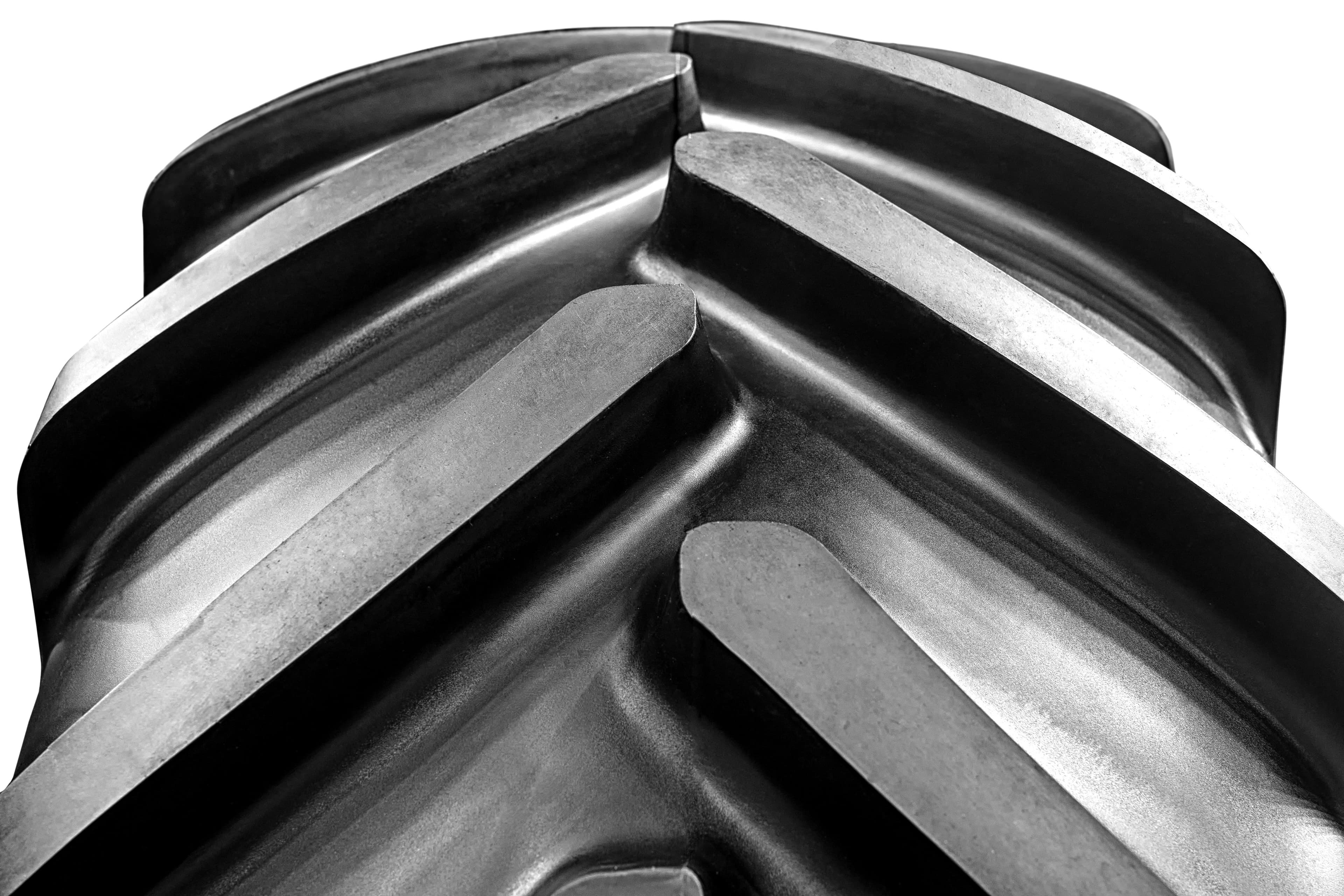 Extreme black and white close up of a large tyre cover 
