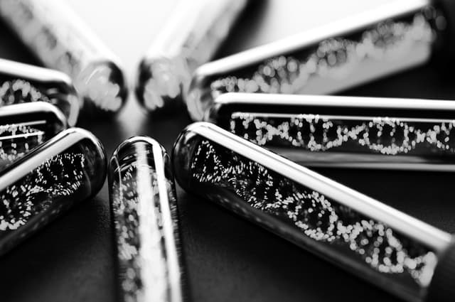 DNA helix spirals in an array of test tubes