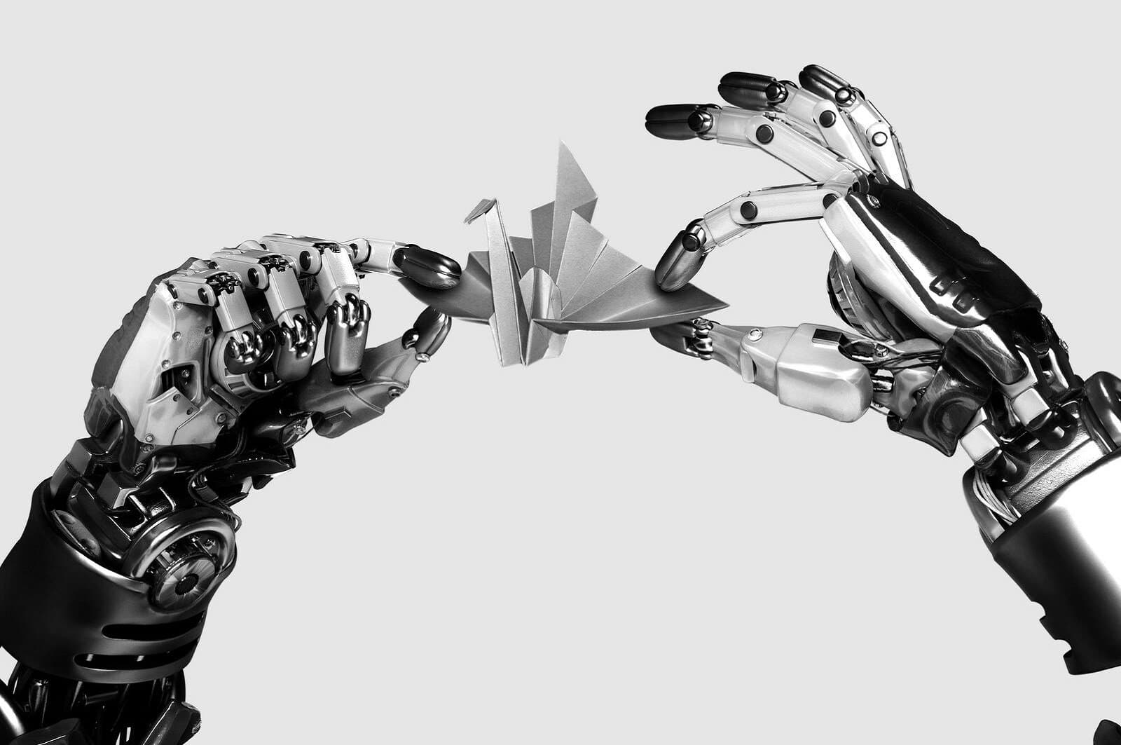 Robot hands making origami 