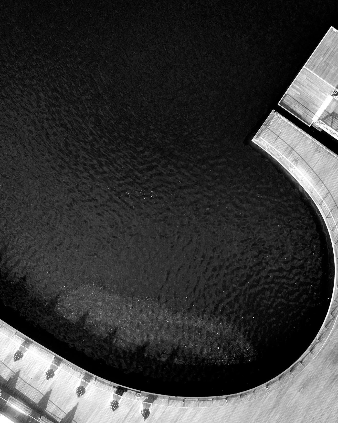 A curved pathway by the water in Singapore