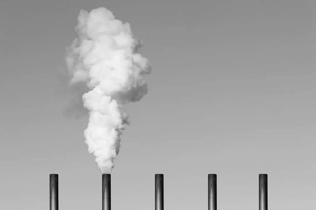Smoke rising from industrial chimneys